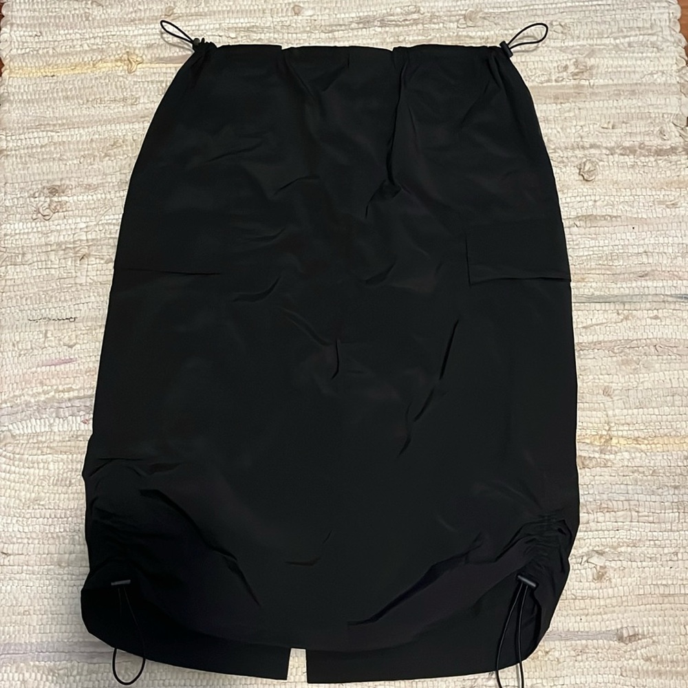 Flap pocket black drawstring side and waist pocket cargo skirt
